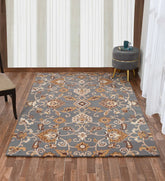 Traditional Persian-inspired rug in gray and gold tones